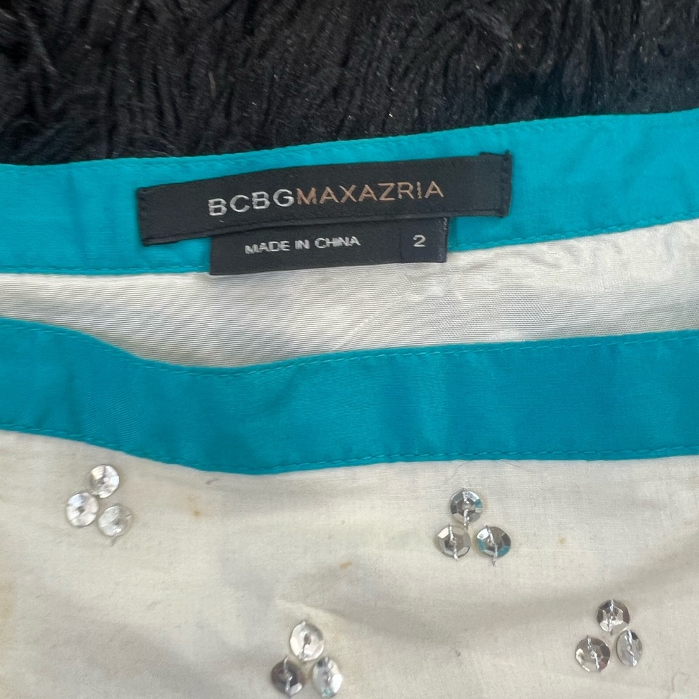 Worn once BCBG skirt. Amazing qualify and slims the waist